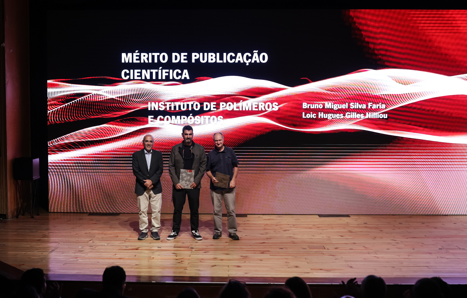 Scientific publication merit recognition at IPC; ceremony photograph